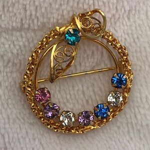 Gold-Tone Multicolor Rhinestones Filigree Circle Brooch - signed PC 12k GF